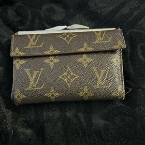 Authentic Vintage Louis Vuitton wallet.